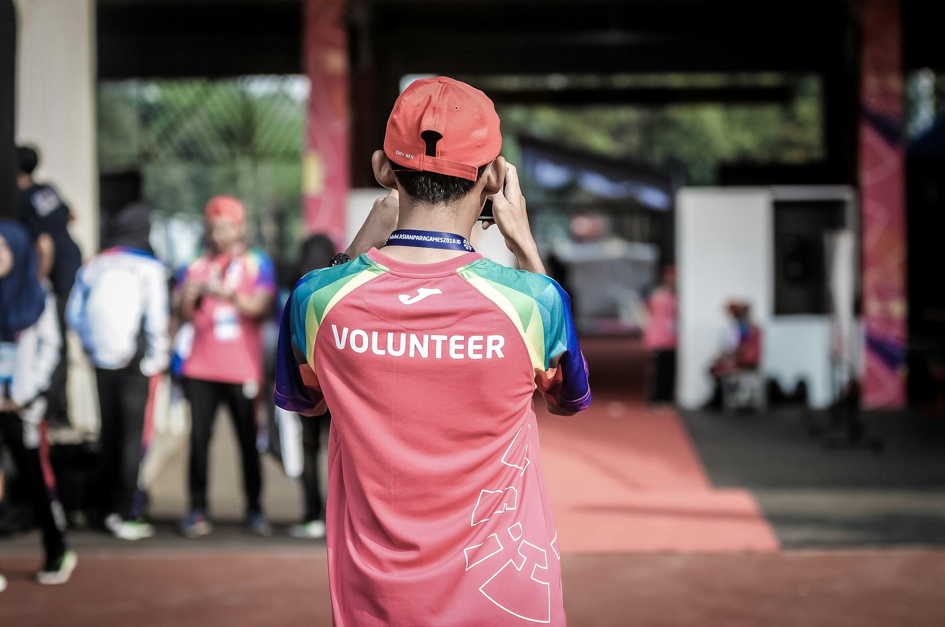 picture of a person wearing a shirt with the word volunteer